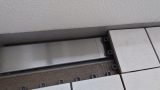 ベランダ排水溝用金具：かぶせる君